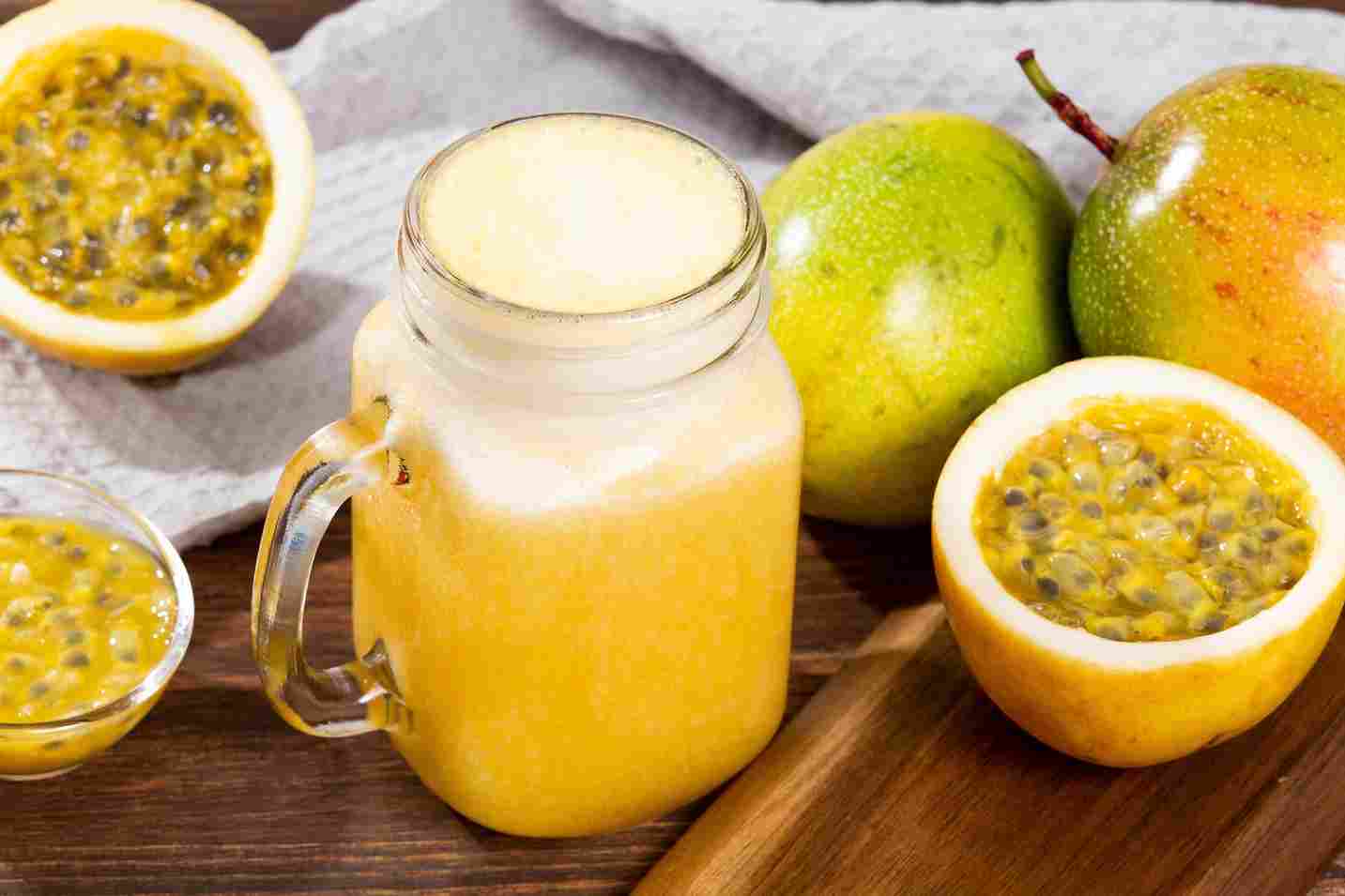 Tasty,Passion,Fruit,Juice;,Photo,On,Wooden,Background